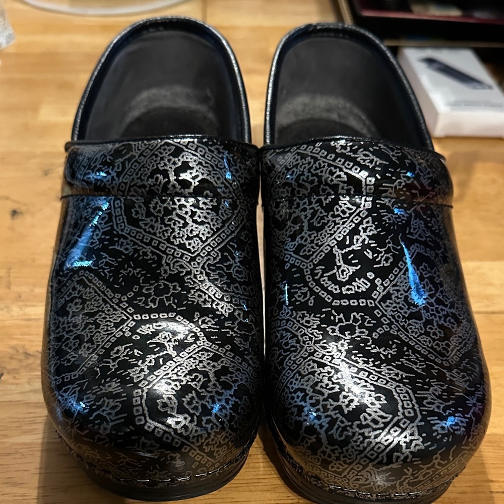Dansko Black and Silver Patterned Clogs